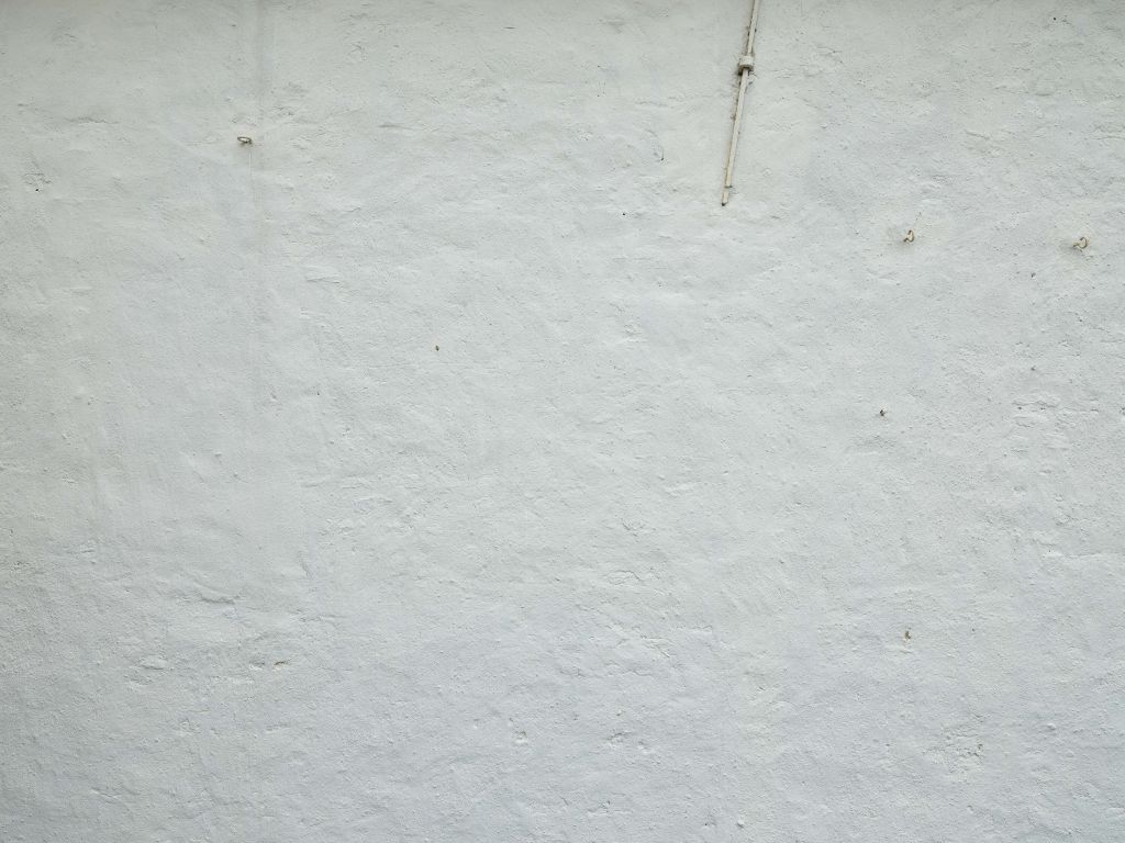 Pared con estuco blanco