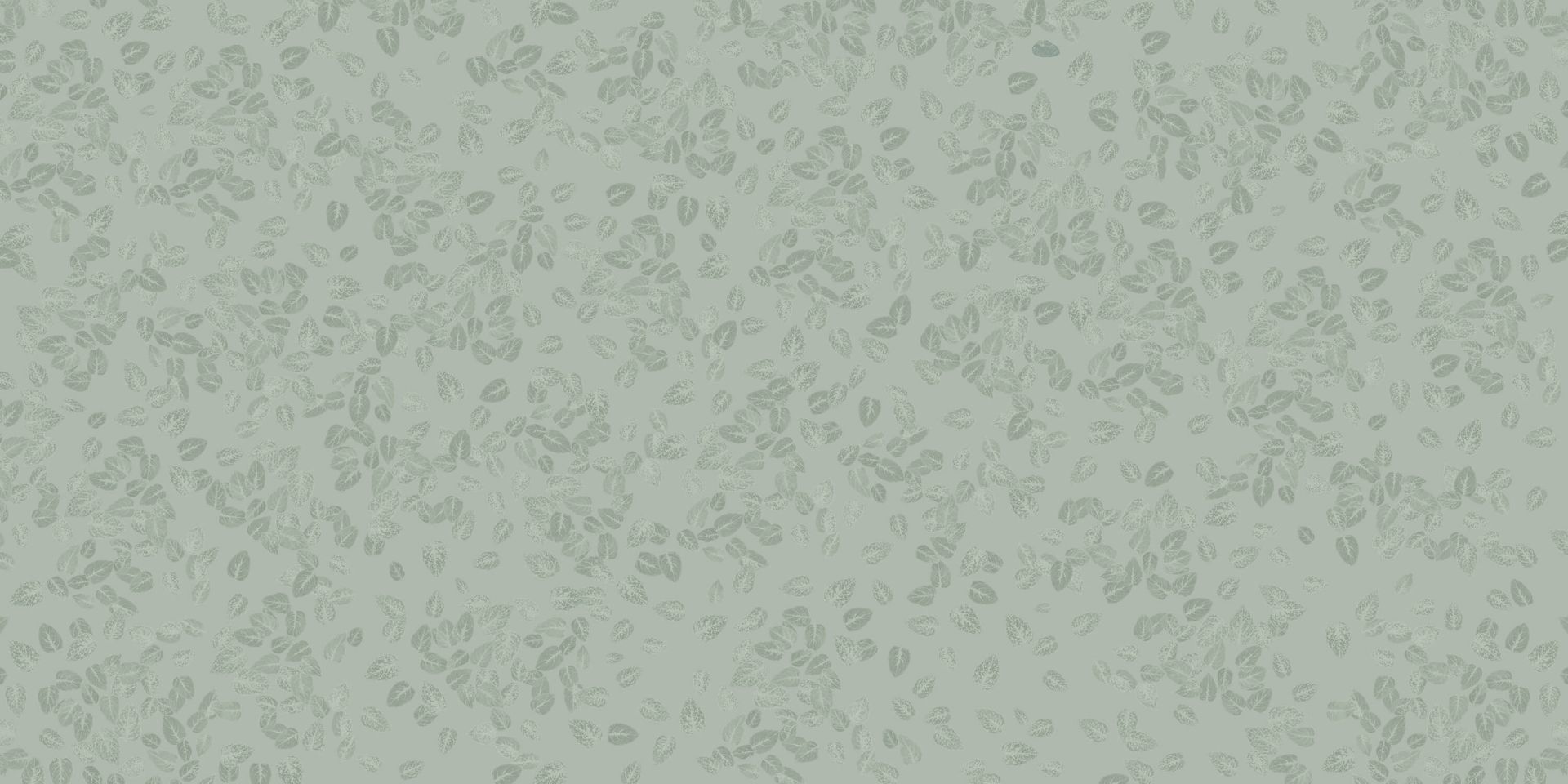 Hojas pequeñas sobre verde grisáceo