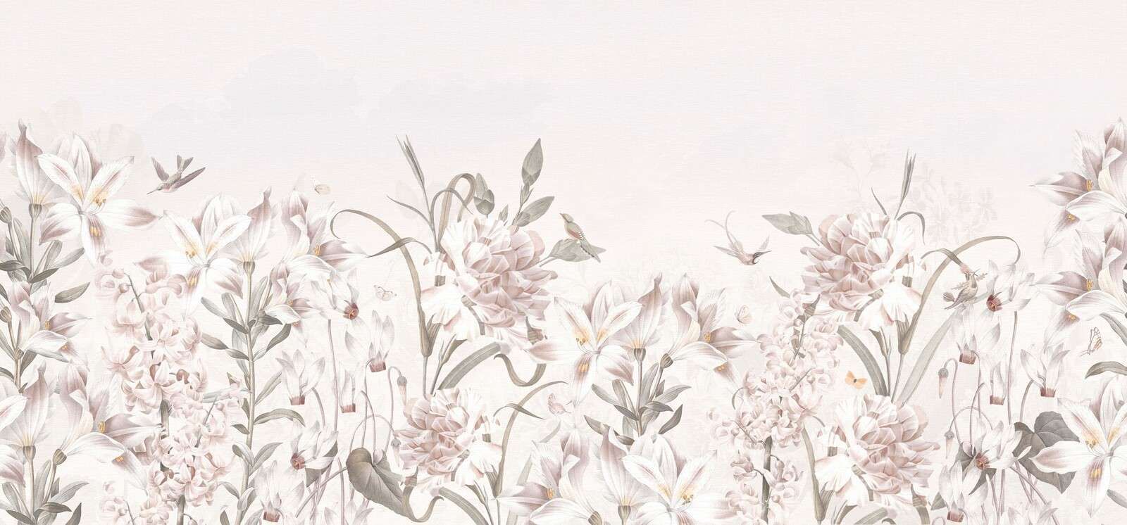 Campo de flores suaves con colibríes